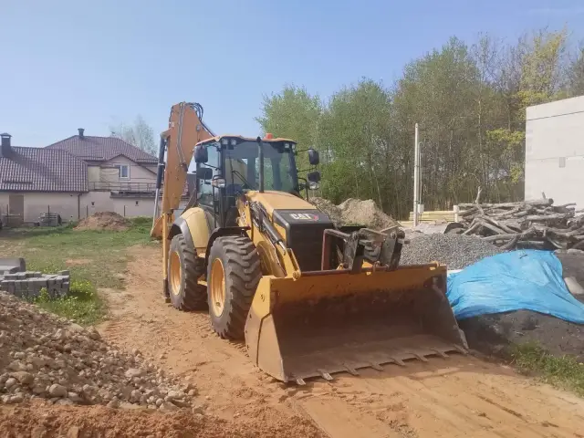 Экскаватор погрузчик САТ 444